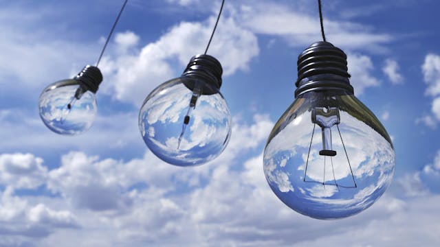 Lightbulbs and blue sky and clouds