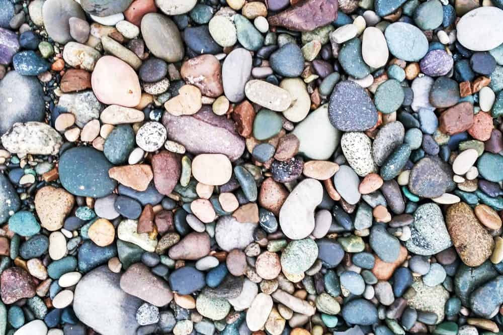 Diverse, colorful pebbles on a beach