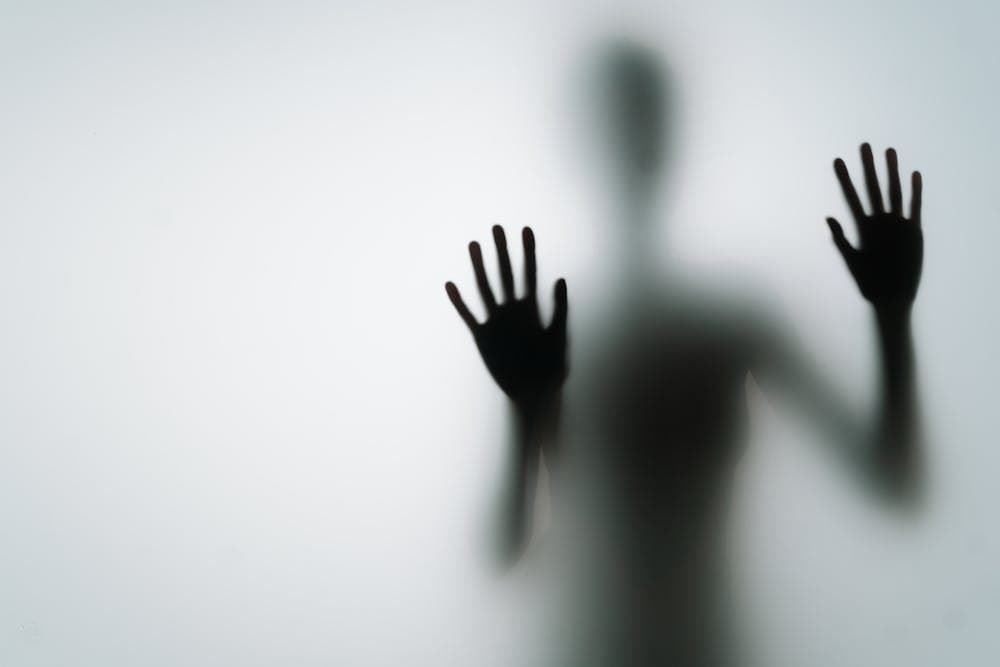 a person in shadow